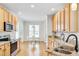Well-lit kitchen featuring granite countertops and stainless steel appliances plus an eat-in dining area at 507 Parkside Cir, Chapel Hill, NC 27516