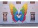 Colorful mural of angel wings, adds a vibrant touch to the building's exterior at 507 Parkside Cir, Chapel Hill, NC 27516