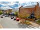 A charming street view with well-maintained buildings, trees, and parked cars under a clear sky at 507 Parkside Cir, Chapel Hill, NC 27516