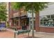 Inviting storefront featuring a wine shop with outdoor seating and attractive brick facade at 507 Parkside Cir, Chapel Hill, NC 27516