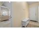 Entryway with tile flooring, coat rack, and bench at 537 Chatham Dr, Chapel Hill, NC 27516