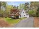 Beautiful two-story home with a well-maintained yard and long driveway at 537 Chatham Dr, Chapel Hill, NC 27516