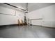 Spacious garage with clean, painted walls, built-in cabinets, and ample storage options at 537 Chatham Dr, Chapel Hill, NC 27516