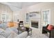 Well-lit living room with a cozy fireplace, elegant furnishings, and a relaxing atmosphere at 537 Chatham Dr, Chapel Hill, NC 27516