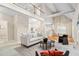 Expansive living room with high ceilings and an open floor plan that connects to the kitchen area at 537 Chatham Dr, Chapel Hill, NC 27516