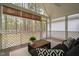 Tranquil screened porch with natural views, offering a perfect space for outdoor relaxation at 537 Chatham Dr, Chapel Hill, NC 27516