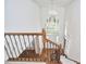 Grand foyer boasts a two-story window, hardwood floors, and an elegant chandelier at 5612 Crossfield Dr, Raleigh, NC 27613