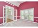 Spacious office with large windows, French doors, and a vaulted ceiling at 5612 Crossfield Dr, Raleigh, NC 27613