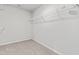 Walk-in closet with carpet and wire shelving at 5989 Zacks Mill Rd, Angier, NC 27501