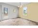 Bright dining room features neutral wall paint, modern light fixture, and tile flooring at 5989 Zacks Mill Rd, Angier, NC 27501
