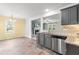 Kitchen showcasing granite countertops, stainless steel appliances, and easy access to dining area at 5989 Zacks Mill Rd, Angier, NC 27501