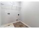 This clean and efficient laundry room offers ample space for all your laundry needs at 5989 Zacks Mill Rd, Angier, NC 27501