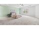 Spacious main bedroom with ample natural light, neutral walls, and plush carpeting at 5989 Zacks Mill Rd, Angier, NC 27501