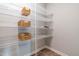 Pantry with multiple shelves, perfect for organized storage of groceries and household items at 5989 Zacks Mill Rd, Angier, NC 27501