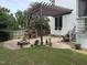 Charming backyard with brick pizza oven, cozy pergola-covered area and stairs to access the back of the home at 6020 Jones Farm Rd, Wake Forest, NC 27587