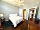 Bright bedroom with hardwood floors, neutral walls, and ample natural light at 6020 Jones Farm Rd, Wake Forest, NC 27587