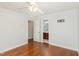 Bedroom featuring hardwood floors and an ensuite bathroom view at 6020 Jones Farm Rd, Wake Forest, NC 27587