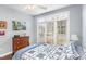 Charming bedroom features a large window for natural light and hardwood flooring at 6020 Jones Farm Rd, Wake Forest, NC 27587