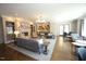 Spacious lounge area featuring hardwood floors, fireplace, comfortable seating and stylish decor at 620 Wade Ave # 206, Raleigh, NC 27605