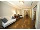 Elegant lobby with herringbone floors, comfortable seating and decorative lighting at 620 Wade Ave # 206, Raleigh, NC 27605