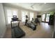 Bright workout room with natural light, ceiling fans, exercise equipment and wall mounted tv at 620 Wade Ave # 206, Raleigh, NC 27605