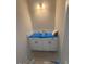 Stylish white bathroom vanity with sleek fixtures and great lighting at 70 Valebrook Ct, Youngsville, NC 27596