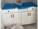 Close-up of a new white vanity cabinet with hardware installed at 70 Valebrook Ct, Youngsville, NC 27596