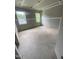 Bedroom featuring drywall and two windows for natural light at 70 Valebrook Ct, Youngsville, NC 27596