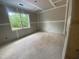 Bedroom featuring drywall, a double window and ample natural light at 70 Valebrook Ct, Youngsville, NC 27596