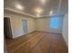Spacious main bedroom with tray ceiling, recessed lights, and en-suite bathroom access at 70 Valebrook Ct, Youngsville, NC 27596