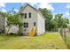 Exterior of home showcasing backyard, stairs, siding, and large lot at 708 Brye St, Durham, NC 27703