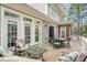 Inviting back deck with dining and seating areas perfect for outdoor relaxation at 76501 Rice, Chapel Hill, NC 27517