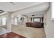 Spacious basement with media area, wet bar access, and neutral tones is ready for customization at 76501 Rice, Chapel Hill, NC 27517