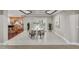 Basement area with tile flooring, dining table, and kitchenette in an open floor plan at 76501 Rice, Chapel Hill, NC 27517