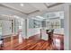 Traditional dining room with hardwood floors, chandelier, and elegant wainscoting detail at 76501 Rice, Chapel Hill, NC 27517