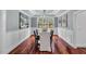 Elegant dining room featuring a chandelier, wainscoting, and large windows at 76501 Rice, Chapel Hill, NC 27517