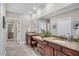 Main bathroom featuring granite countertops, dual sinks and a walk-in shower at 76501 Rice, Chapel Hill, NC 27517