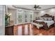 Sun-filled main bedroom with hardwood floors and access to a private deck at 76501 Rice, Chapel Hill, NC 27517