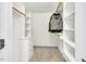 Well-organized walk-in closet with shelving, drawers, and hanging space for ample storage at 76501 Rice, Chapel Hill, NC 27517