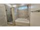 A luxurious bathroom is complete with a soaking tub and a tiled shower at 795 Terry Rd, Hurdle Mills, NC 27541