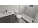 Bathroom with a marble sink top and a seamless glass shower at 795 Terry Rd, Hurdle Mills, NC 27541