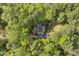 Areal view of a home nestled in a forest; complete privacy with mature hardwood coverage at 8008 Hollander Pl, Raleigh, NC 27606