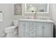 Elegant bathroom featuring a marble vanity, double sinks, and classic fixtures, perfect for a modern home at 8008 Hollander Pl, Raleigh, NC 27606