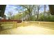 Expansive new wooden deck with backyard views. Great for entertaining at 909 Windcrest Rd, Durham, NC 27713