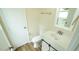 Updated bathroom with modern vanity and new toilet at 909 Windcrest Rd, Durham, NC 27713