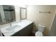 Modern bathroom featuring a new vanity and updated fixtures at 909 Windcrest Rd, Durham, NC 27713