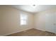 Cozy bedroom with natural light and modern flooring at 909 Windcrest Rd, Durham, NC 27713