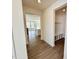 Inviting foyer with wood-look floors, mudroom storage, and an open view to the living spaces at 91 Brooklynn Trl # 187, Angier, NC 27501