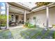 Charming backyard with a mix of patio, stone and plant features at 989 Ambergate Sta, Apex, NC 27502