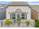 Upstairs balcony with plants and seating offers an inviting outdoor space at 989 Ambergate Sta, Apex, NC 27502
